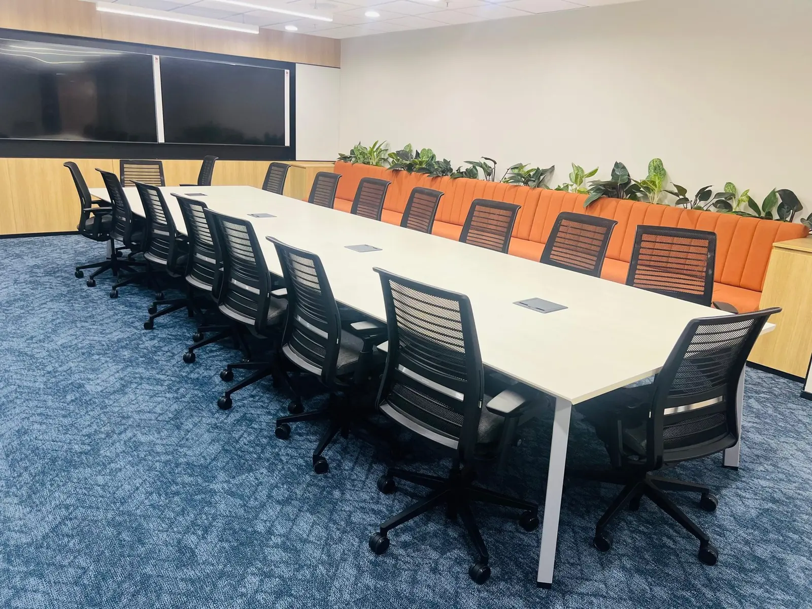 Boardroom table with integrated seating
